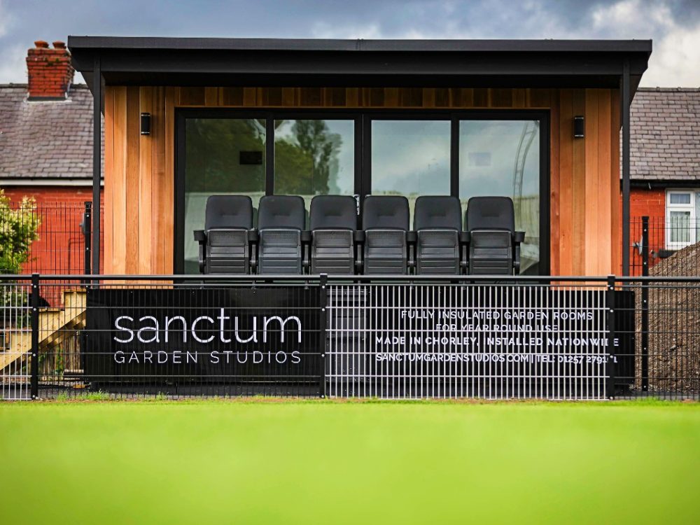 5.4m x 3m studio with bespoke 2m overhang, composite decking, aluminium bifolding doors and outside lights