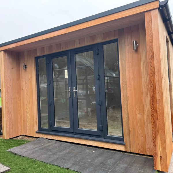 6m x 3.8m Contemporary Overhang Studio with bespoke 500mm overhang and side cheeks