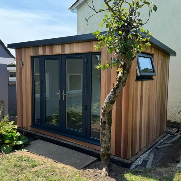 3.6m x 2.4m contemporary overhang with french doors, side lights, letterbox window and outside lights