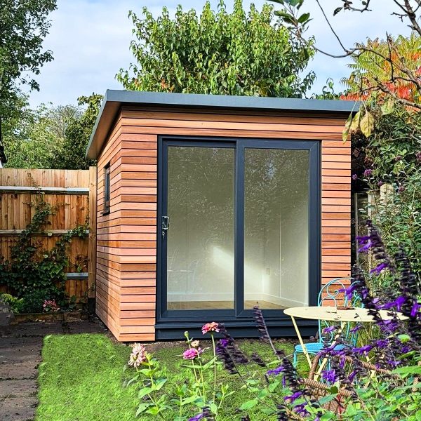 2.4 wide x 3m deep bespoke with 1.8m wide UPVC sliders