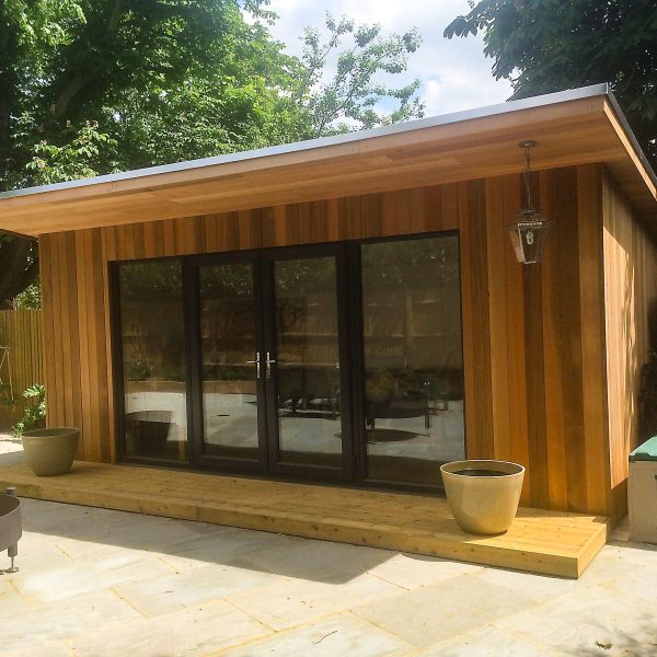 5.4m x 3.5m Bespoke studio with 1m overhang, french doors and side lights