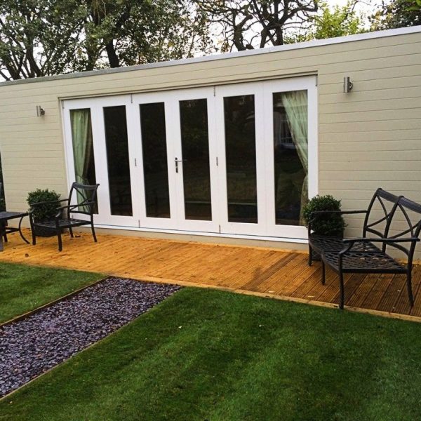 5.4m x 3.5m horizontal silver birch composite studio with white bifolding doors and outside lights