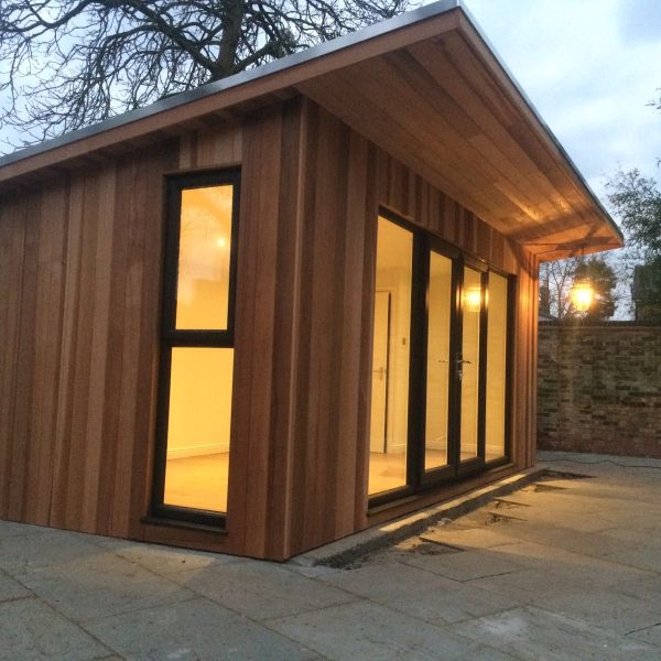 6m x 3m Bespoke studio with 1m overhang, french doors, side lights and side opening window