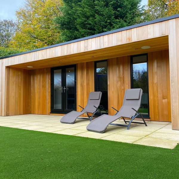 7m x 4.1m bespoke overhang with side cheeks, french doors, full height fixed windows and inset downlights