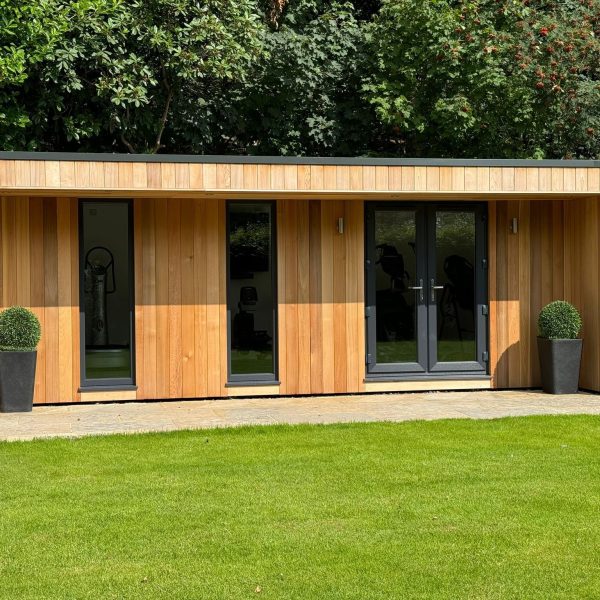 7.2m x 3.5m Bespoke studio with side cheeks, french doors and full height fixed windows