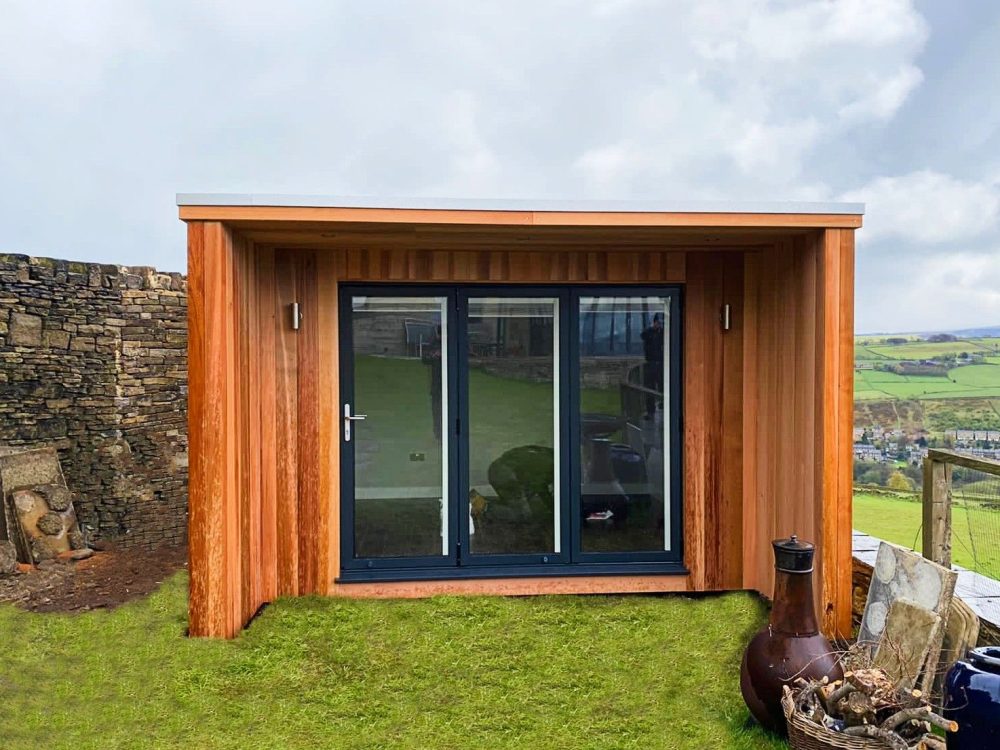 3.6m x 3.5m with bespoke overhang with cheeks, aluminium bifolding doors and outside lights