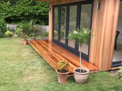 4.2m x 3m bespoke overhang with aluminium bifolding doors and outside lights