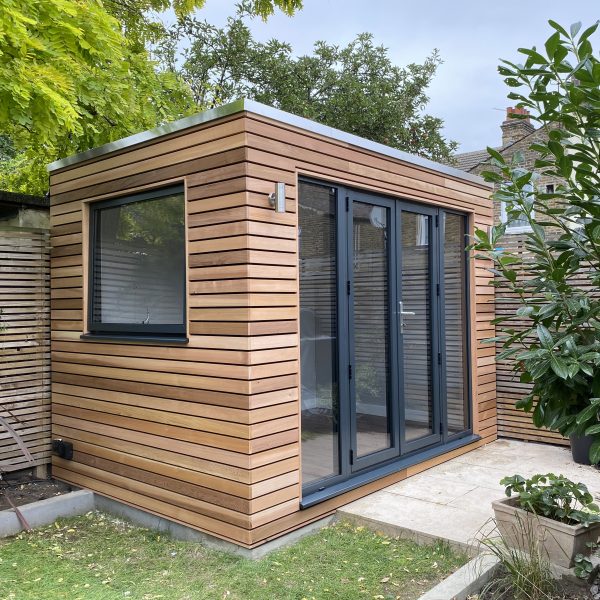 bespoke horizontal clad studio with French doors and side lights