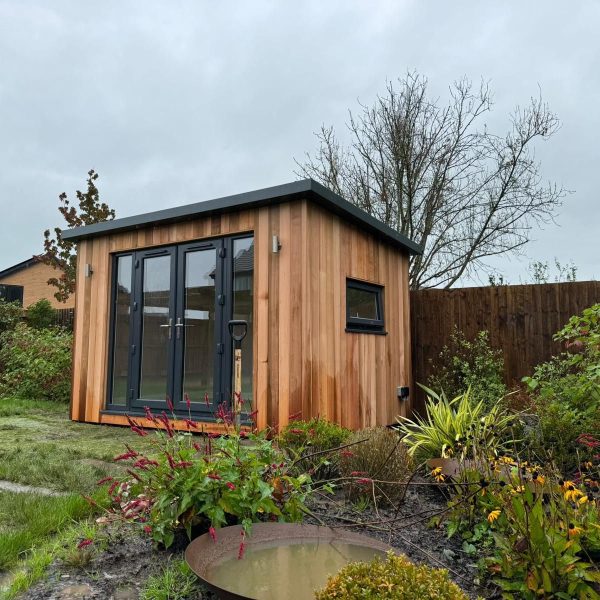Contemporary Overhang with french doors, sidelights, outside light and side opening window